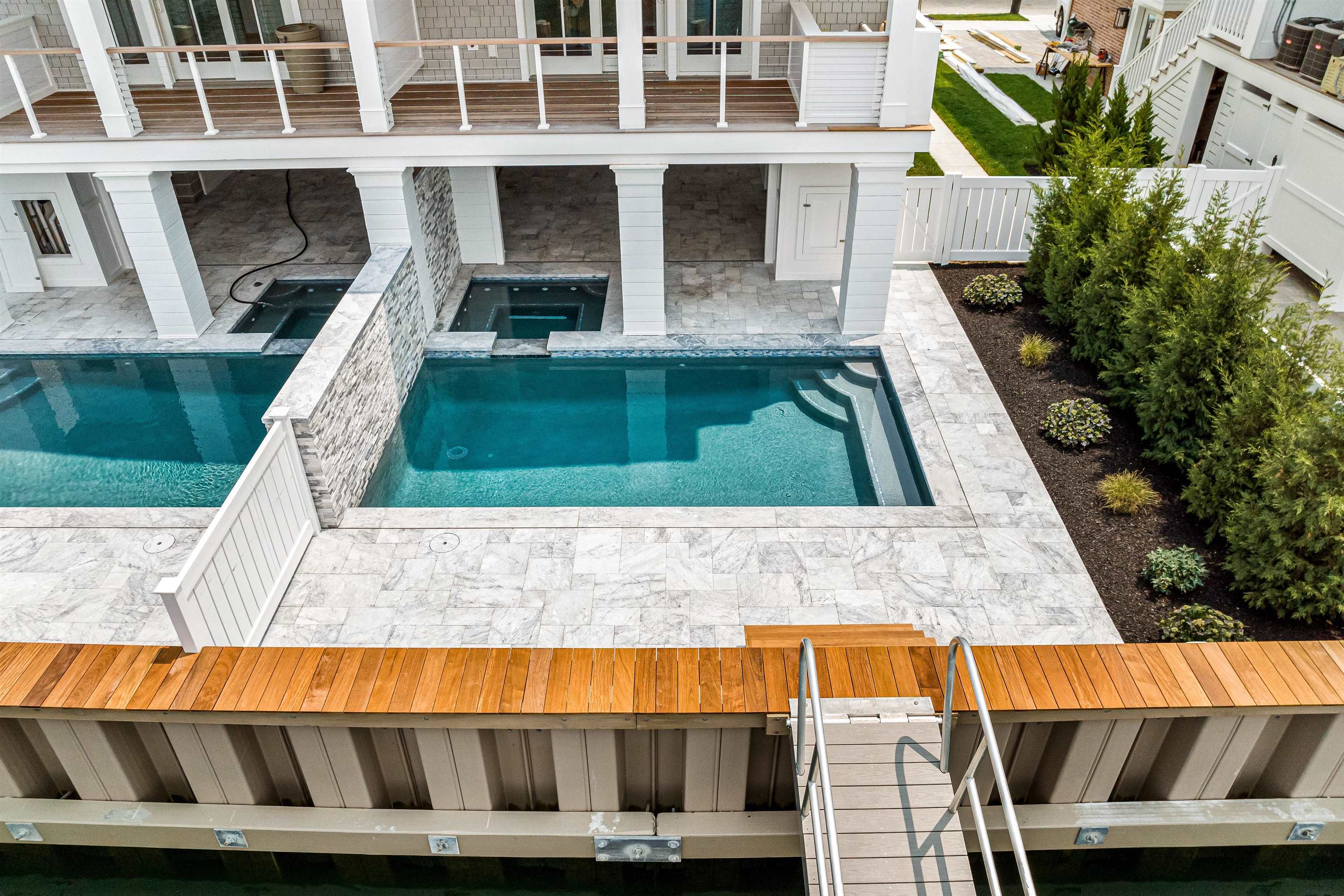 2158 Ocean Drive, Unit 2158 Avalon, NJ 08202 - Photo 4 of 50 a view of outdoor space with swimming pool and barbeque oven