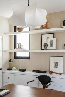 a workspace with furniture and window