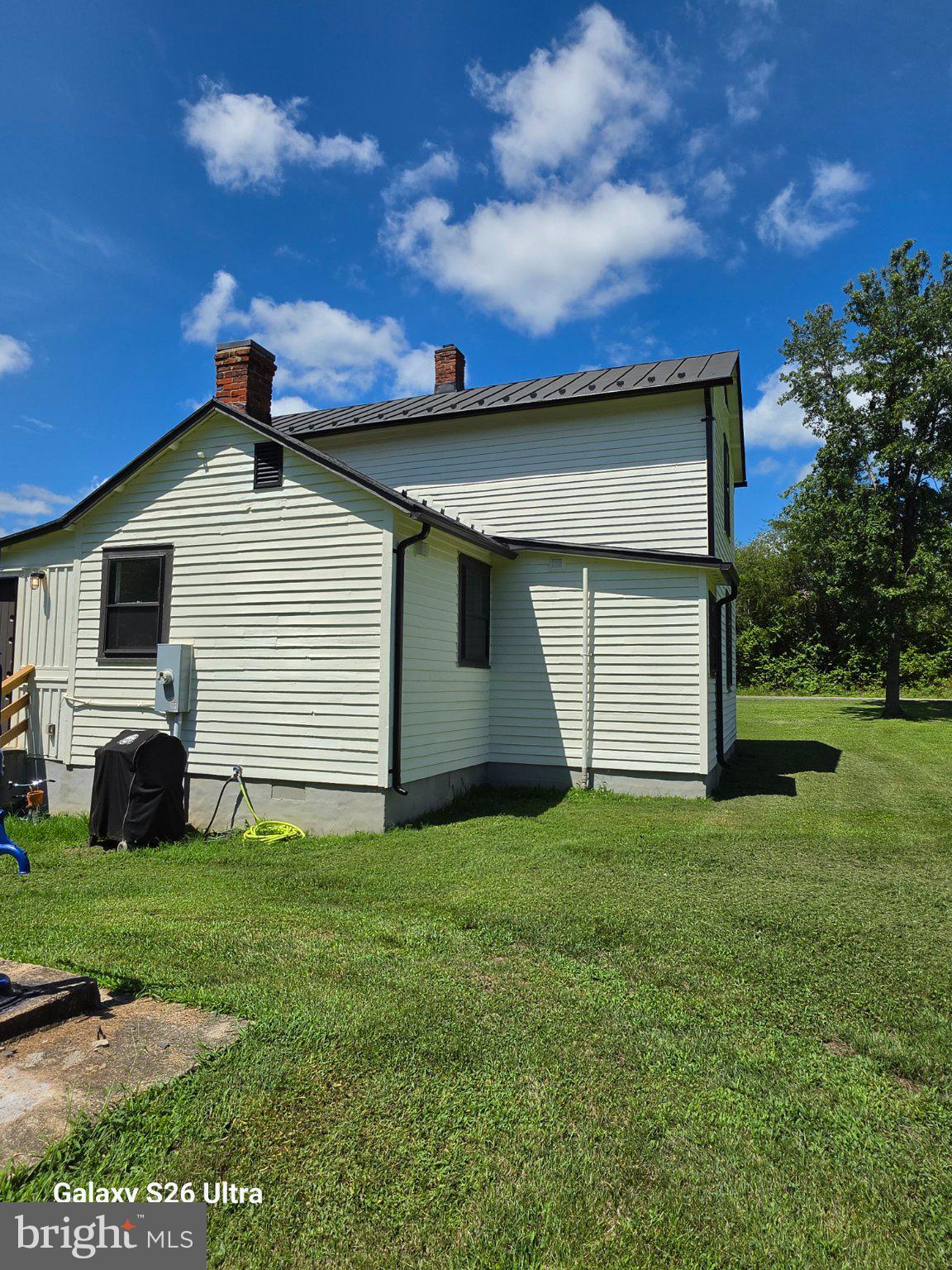 22729 Rapidan Road Mitchells, VA 22729 - Photo 38 of 39 Charming home under a bright sky.