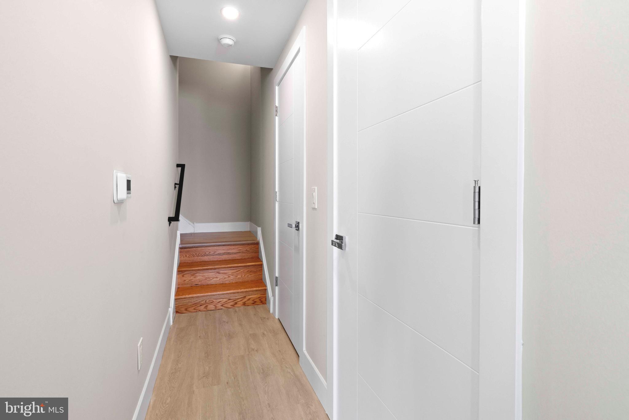 4720 Richmond Street, Unit 4 Philadelphia, PA 19137 - Photo 13 of 26 a view of a hallway with stairs