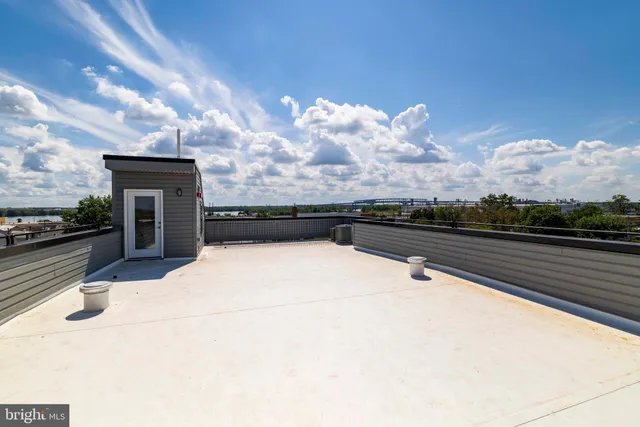 a view of balcony with furniture