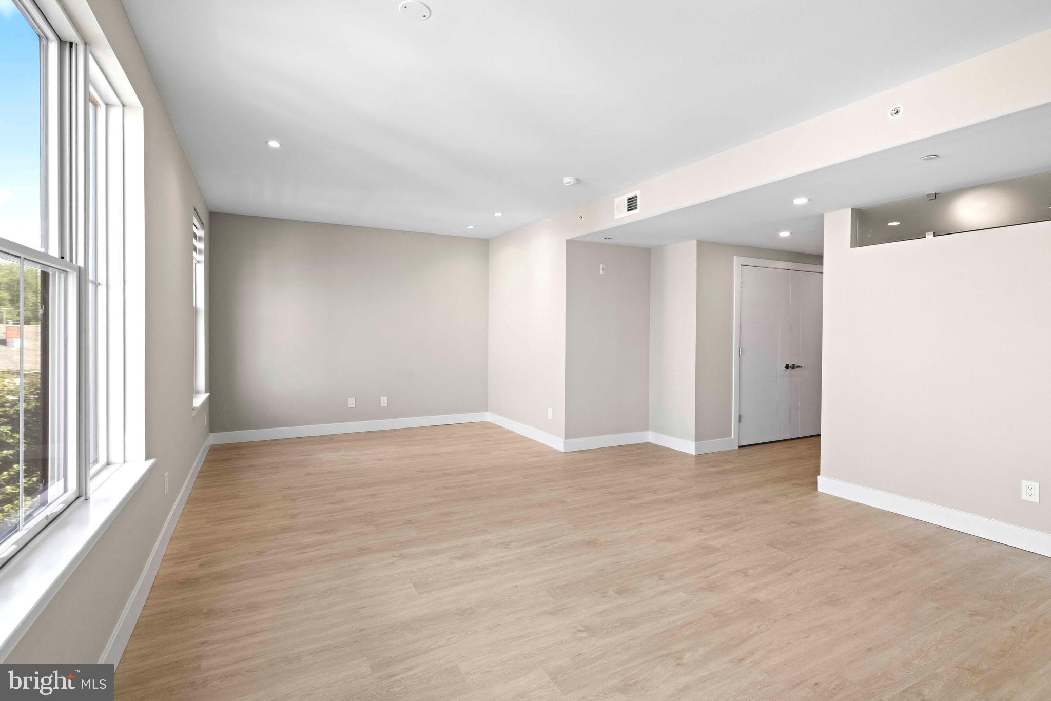 4720 Richmond Street, Unit 4 Philadelphia, PA 19137 - Photo 6 of 26 a view of an empty room with a window