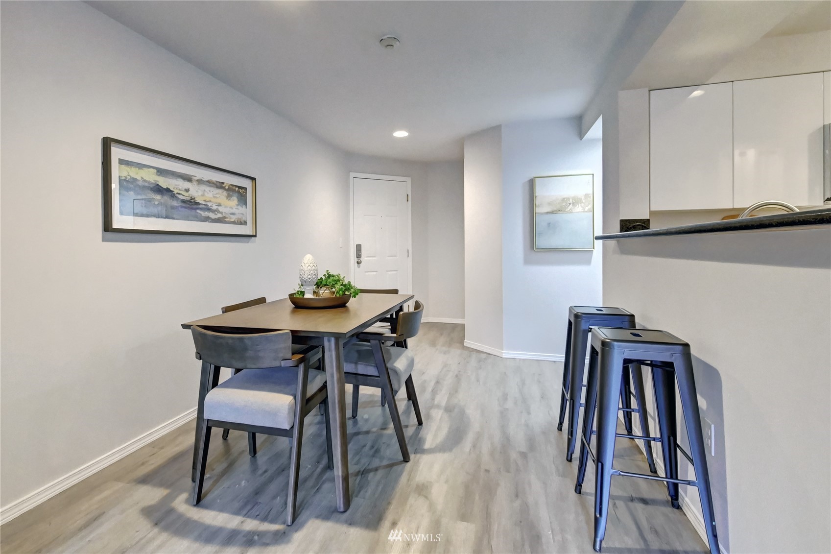 23908 Bothell Everett Highway, Unit B101 Bothell, WA 98021 - Photo 6 of 29 a view of a dining room with furniture