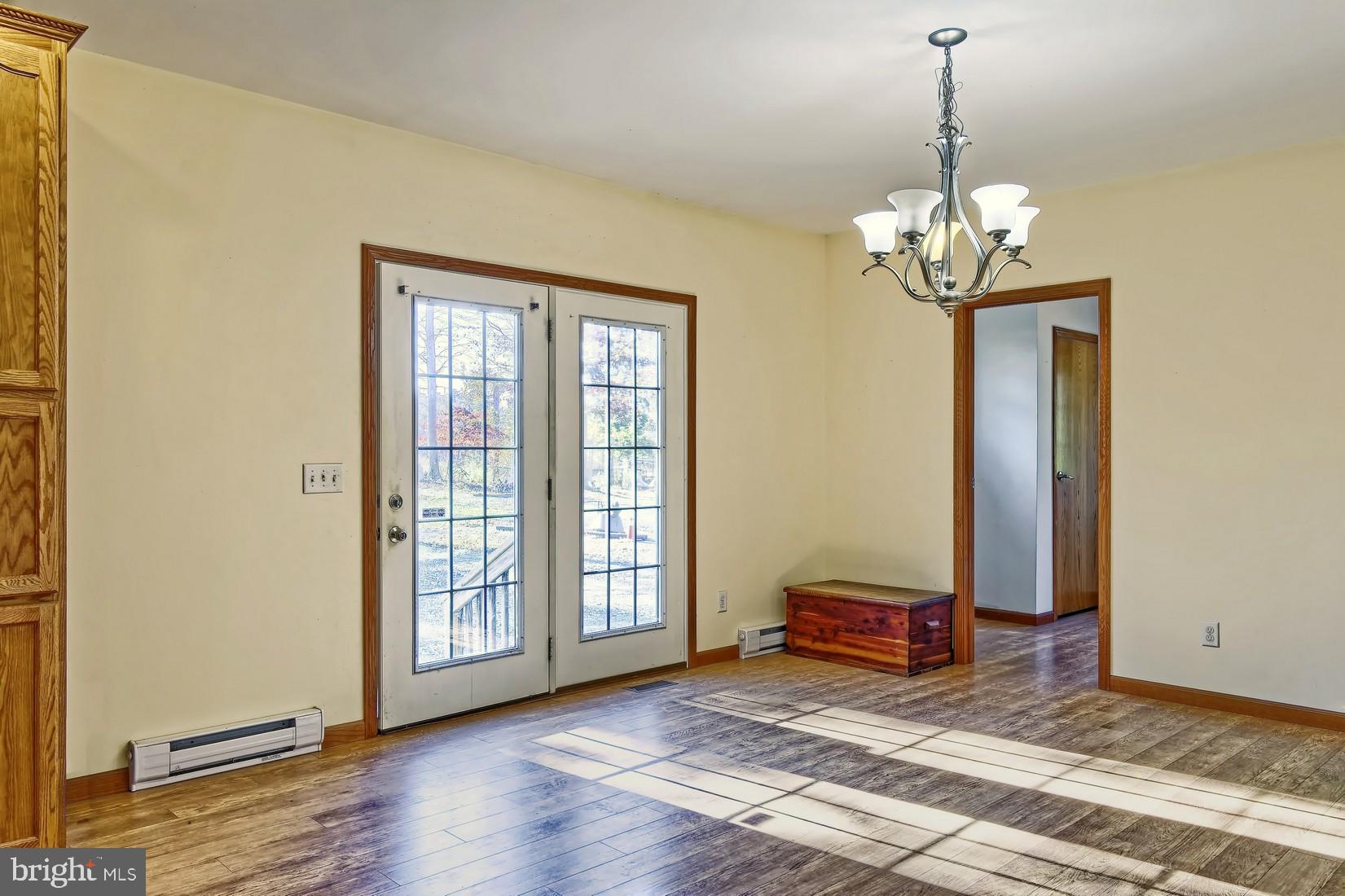 557 Harmersville - Pecks Corner Road Quinton, NJ 08079 - Photo 8 of 22 back door and dining room