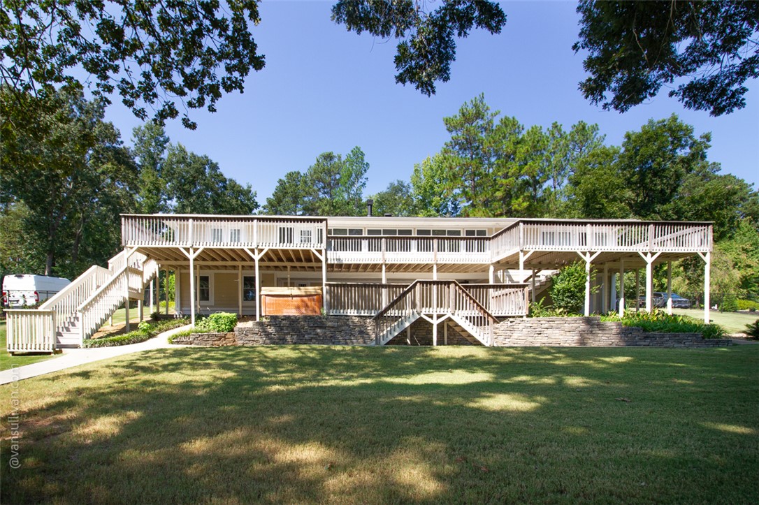 4518 Cove Trail Anderson, SC 29621 - Photo 9 of 49 Entertaining friends and family is a breeze with this multi-level wooden decking overlooking a grassy lawn and beautiful Lake Hartwell views.
