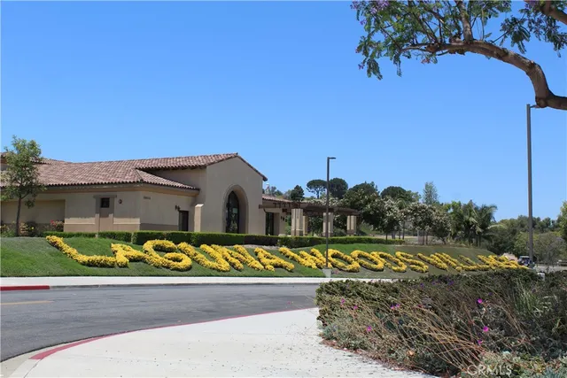 a view of a swimming pool with an outdoor space and seating area