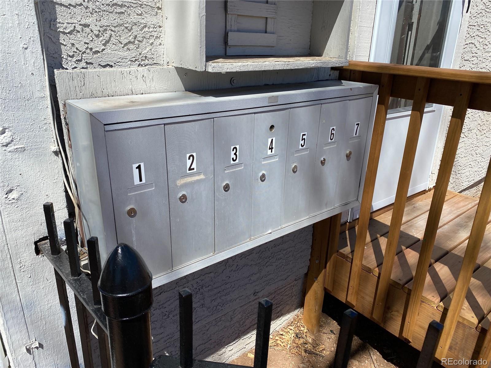 2422 West Vermijo Avenue, Unit 7 Colorado Springs, CO 80904 - Photo 6 of 6 a view of staircase with wooden floor