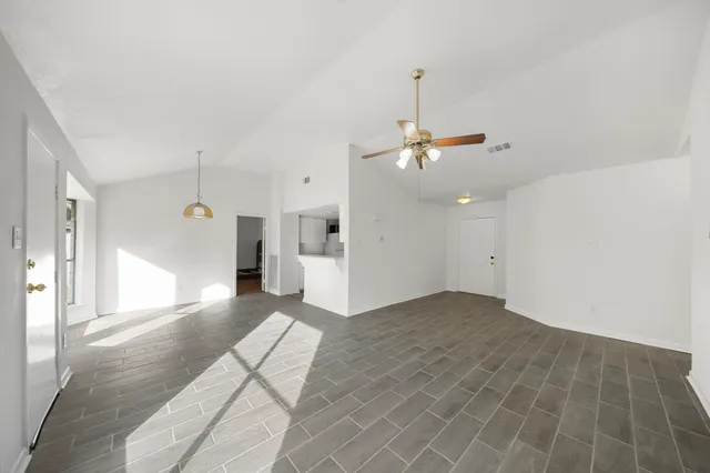 a view of a livingroom with a staircase