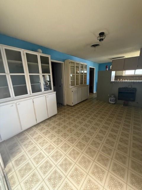 909 Railroad Street Rochester, TX 79544 - Photo 5 of 19 a view of an empty room with a window