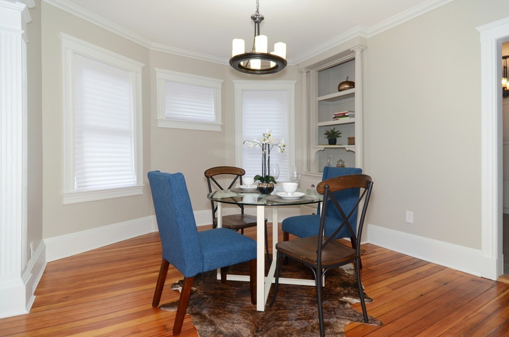 19 Rill Street, Unit 2 Boston, MA 02125 - Photo 6 of 19 a view of a dining room with furniture window and wooden floor