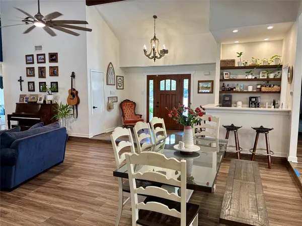 a view of a dining room with furniture