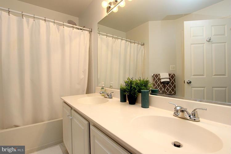 11864 Breton Court, Unit 14A Reston, VA 20191 - Photo 21 of 23 Master Bath with Double Vanity
