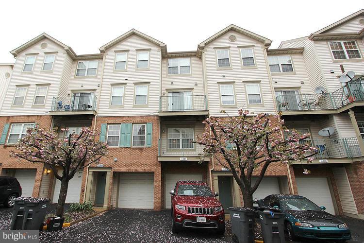 11864 Breton Court, Unit 14A Reston, VA 20191 - Photo 22 of 23 Driveway with Attached Garage! Easy Parking