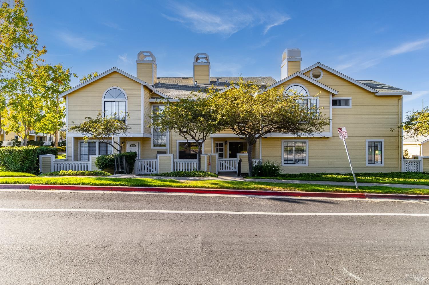 a view of street along with houses