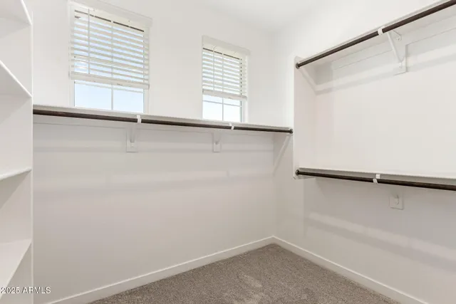 a view of a small space with racks on the wall