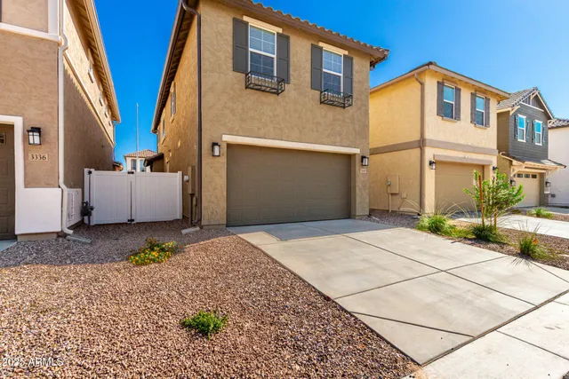 a view of swimming pool with outdoor seating and plants