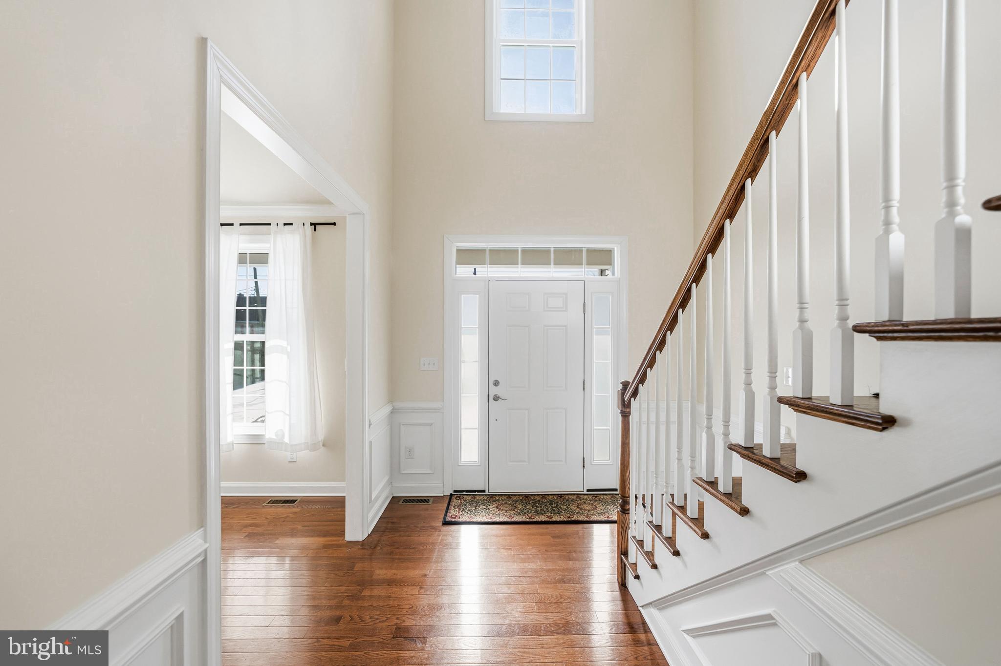 4777 Old Easton Road Doylestown, PA 18902 - Photo 12 of 26 a view of an entryway with wooden floor and stairs