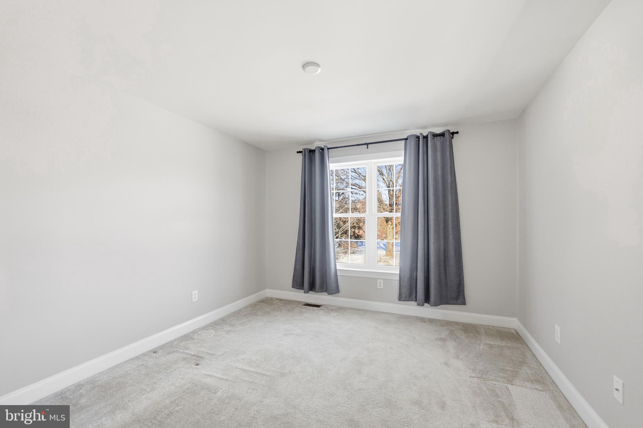 4777 Old Easton Road Doylestown, PA 18902 - Photo 19 of 26 an empty room with windows
