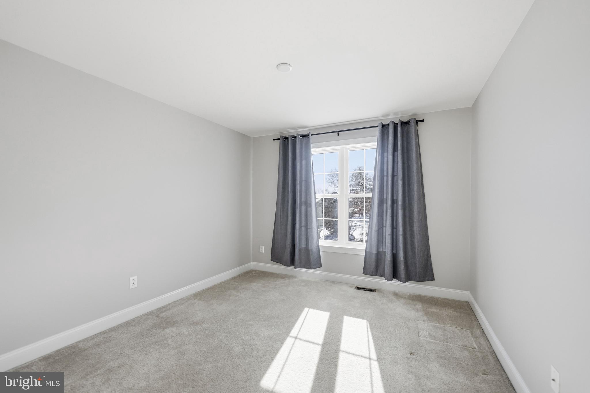 4777 Old Easton Road Doylestown, PA 18902 - Photo 22 of 26 an empty room with windows