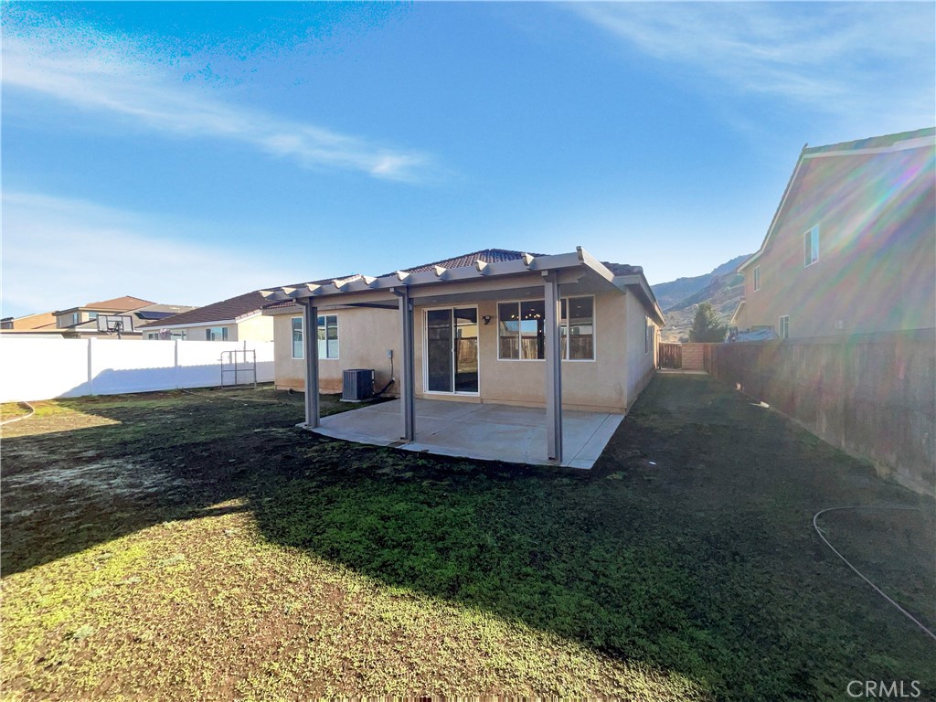 26625 Emperor Road Menifee, CA 92585 - Photo 23 of 24 a view of a house with a yard