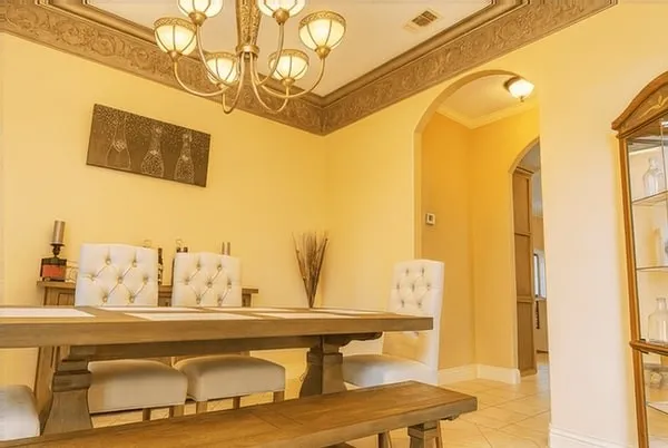 a view of a balcony with furniture