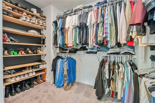 a view of livingroom with furniture and windows