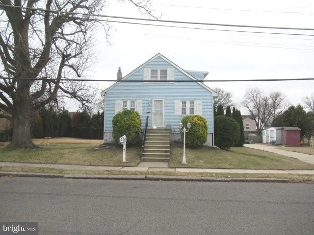 a view of a house with a iron fence