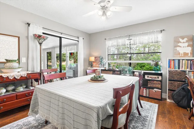a view of a dining room with furniture window and outside view