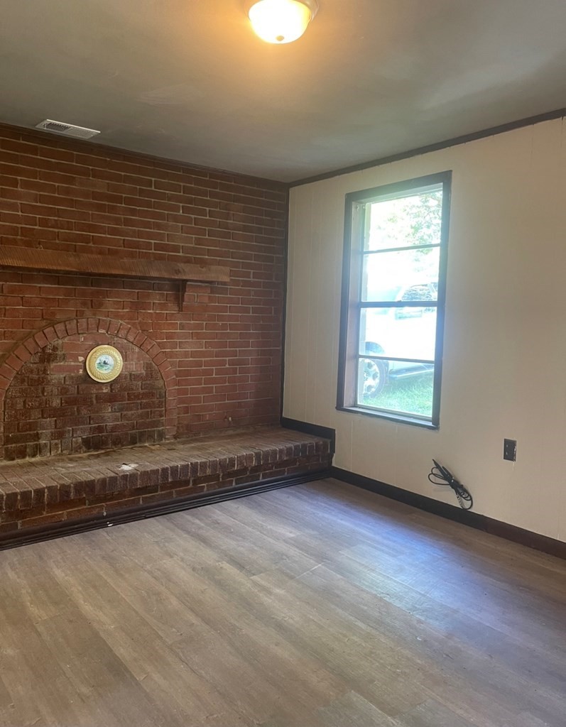 457 River Road Chatsworth, GA 30705 - Photo 10 of 18 a view of an empty room with a window