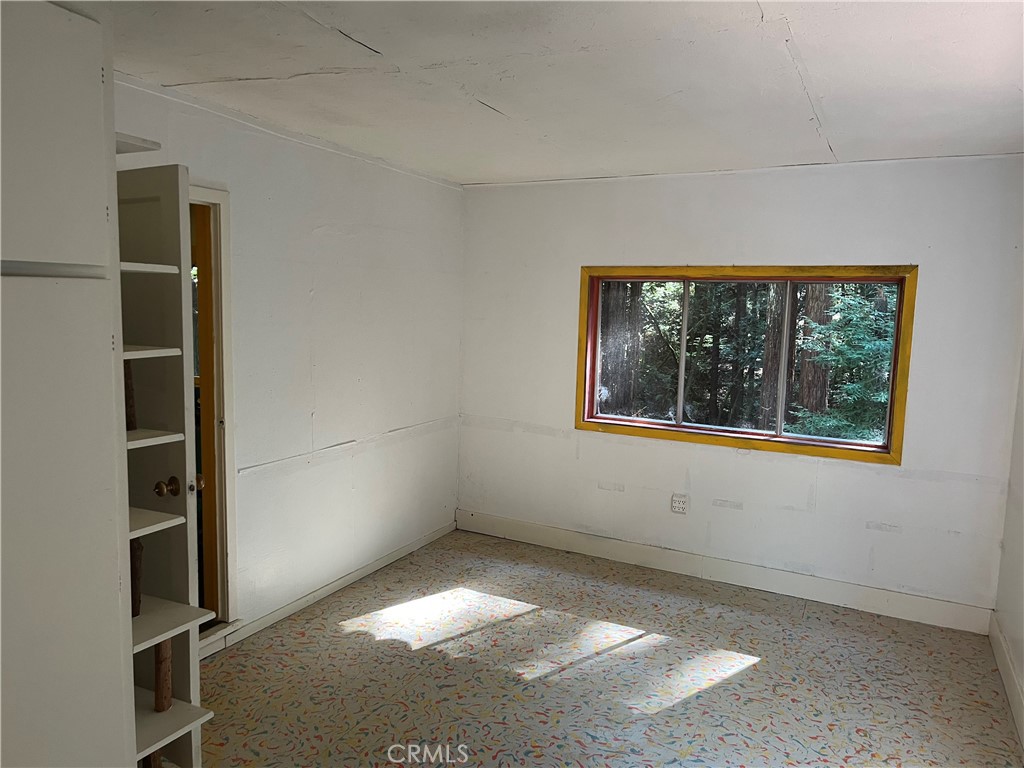 16125 Bittner Road Occidental, CA 95465 - Photo 12 of 40 a view of an empty room with a window
