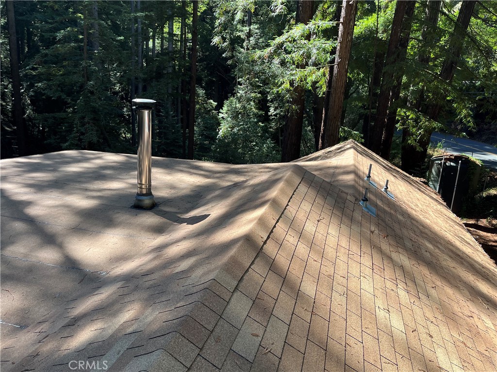 16125 Bittner Road Occidental, CA 95465 - Photo 16 of 40 a view of a pathway both side of house