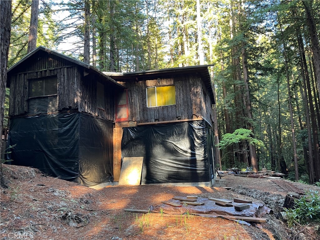 16125 Bittner Road Occidental, CA 95465 - Photo 19 of 40 a view of a house with a tree