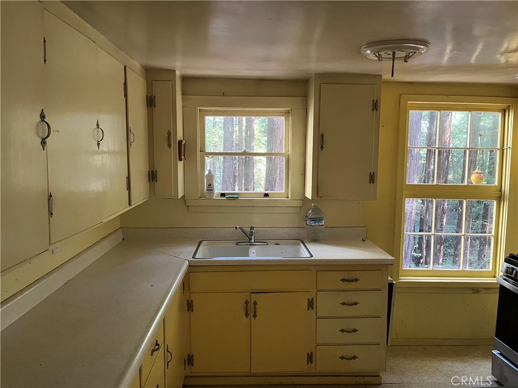 16125 Bittner Road Occidental, CA 95465 - Photo 5 of 40 a bathroom with a sink and a mirror