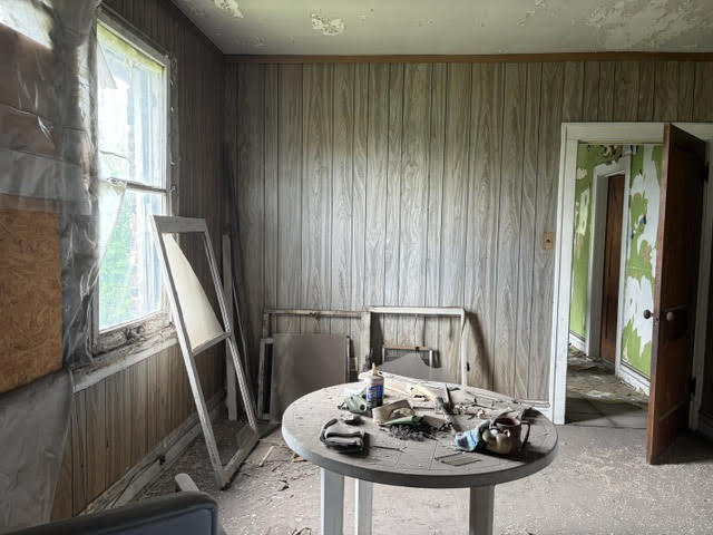 304 Polk Street Gary, IN 46402 - Photo 7 of 26 a view of a dining room with furniture window and outside view