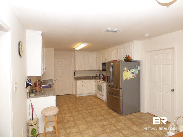 7453 Fairmont Drive Foley, AL 36535 - Photo 11 of 25 kitchen 2