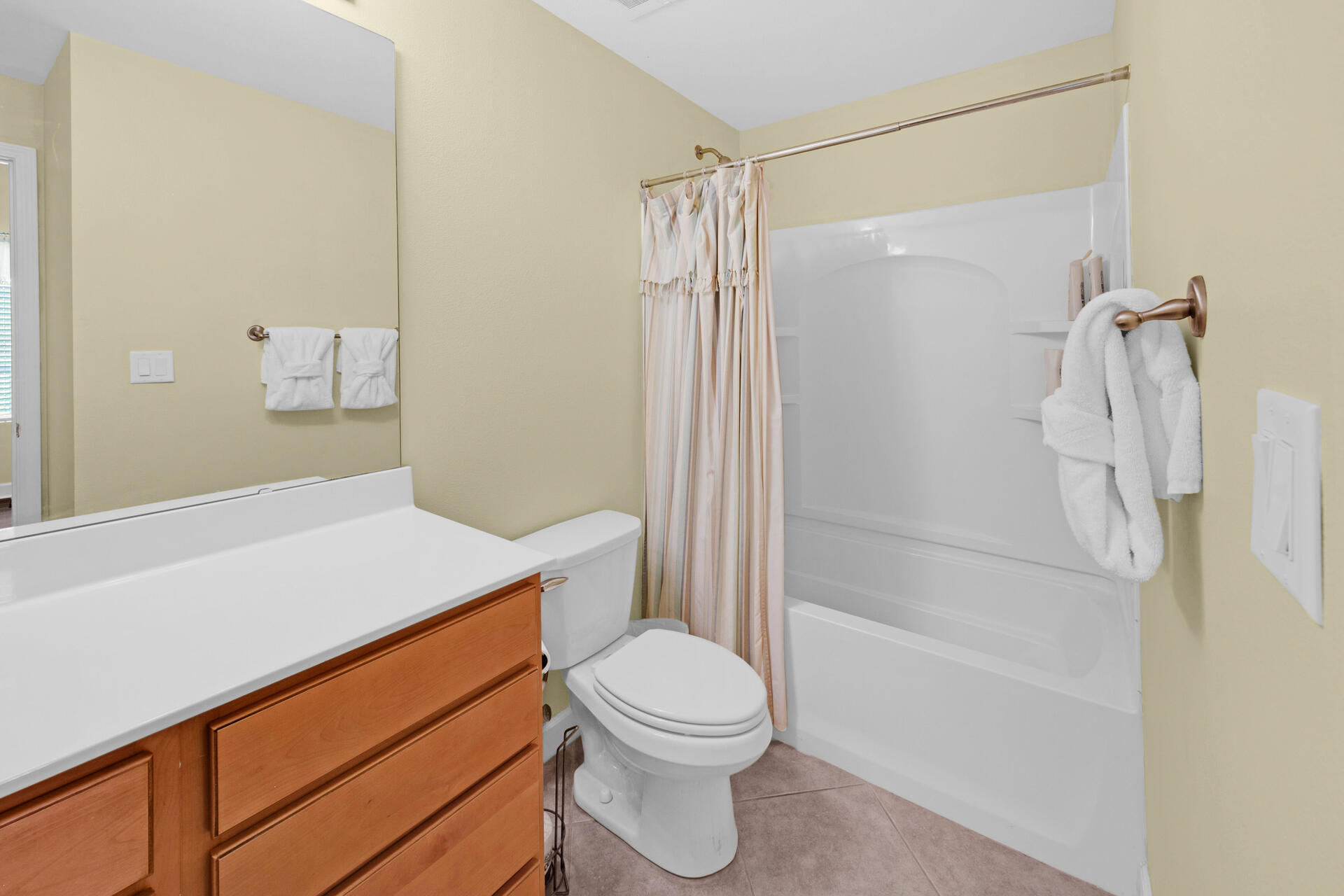 548 Sandy Cay Drive, Unit 309 Miramar Beach, FL 32550 - Photo 11 of 47 a bathroom with a sink a toilet and shower