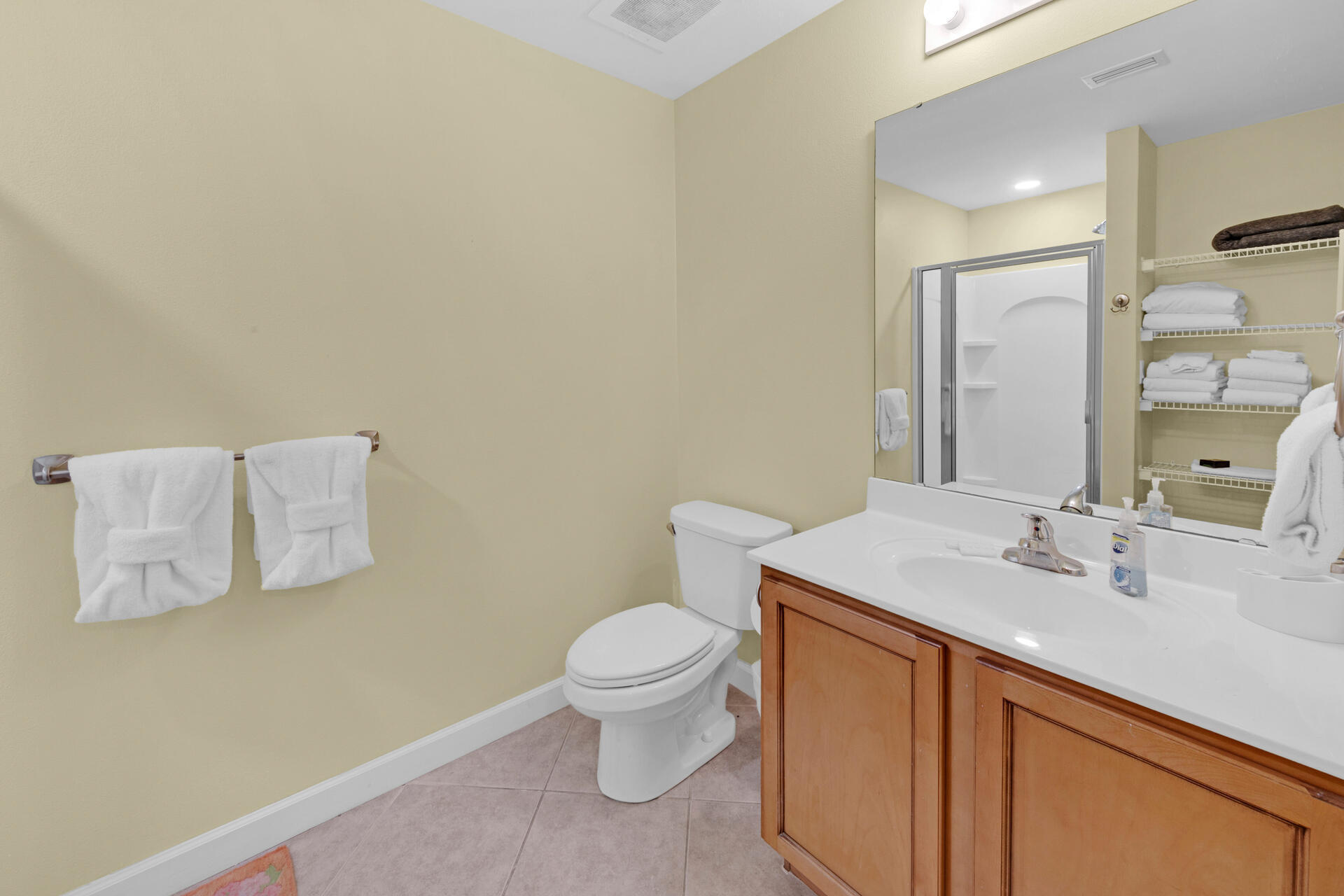 548 Sandy Cay Drive, Unit 309 Miramar Beach, FL 32550 - Photo 14 of 47 a bathroom with a sink a toilet and mirror