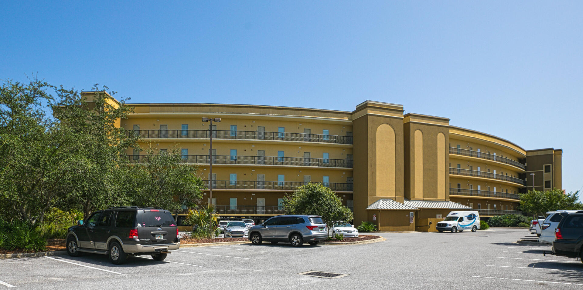 548 Sandy Cay Drive, Unit 309 Miramar Beach, FL 32550 - Photo 2 of 47 a car parked in front of a building