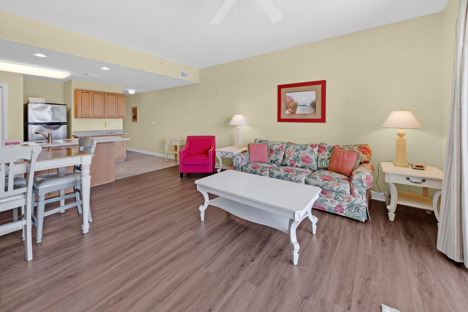 548 Sandy Cay Drive, Unit 309 Miramar Beach, FL 32550 - Photo 23 of 47 a living room with furniture and a wooden floor