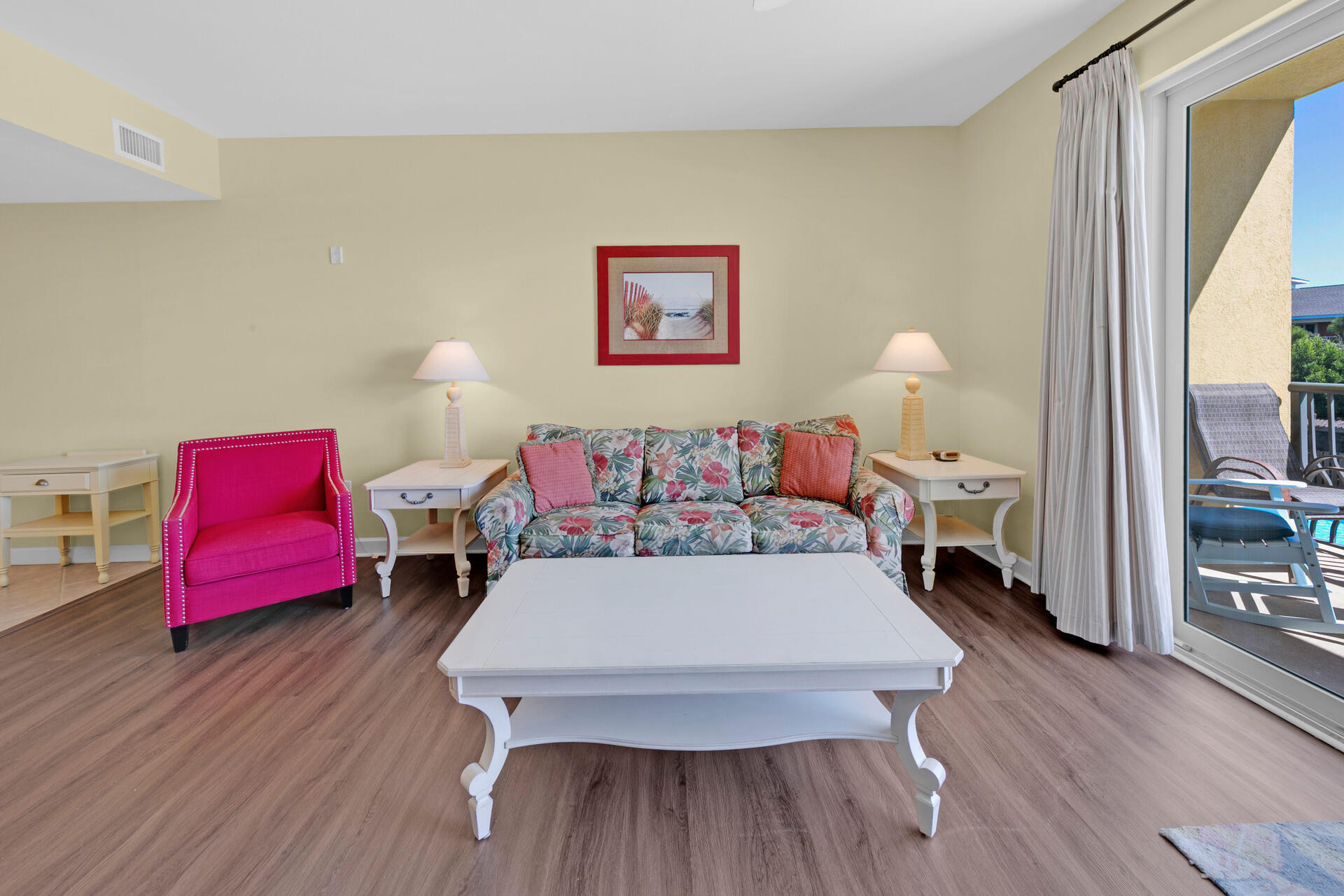 548 Sandy Cay Drive, Unit 309 Miramar Beach, FL 32550 - Photo 26 of 47 a living room with furniture a wooden floor and next to a window