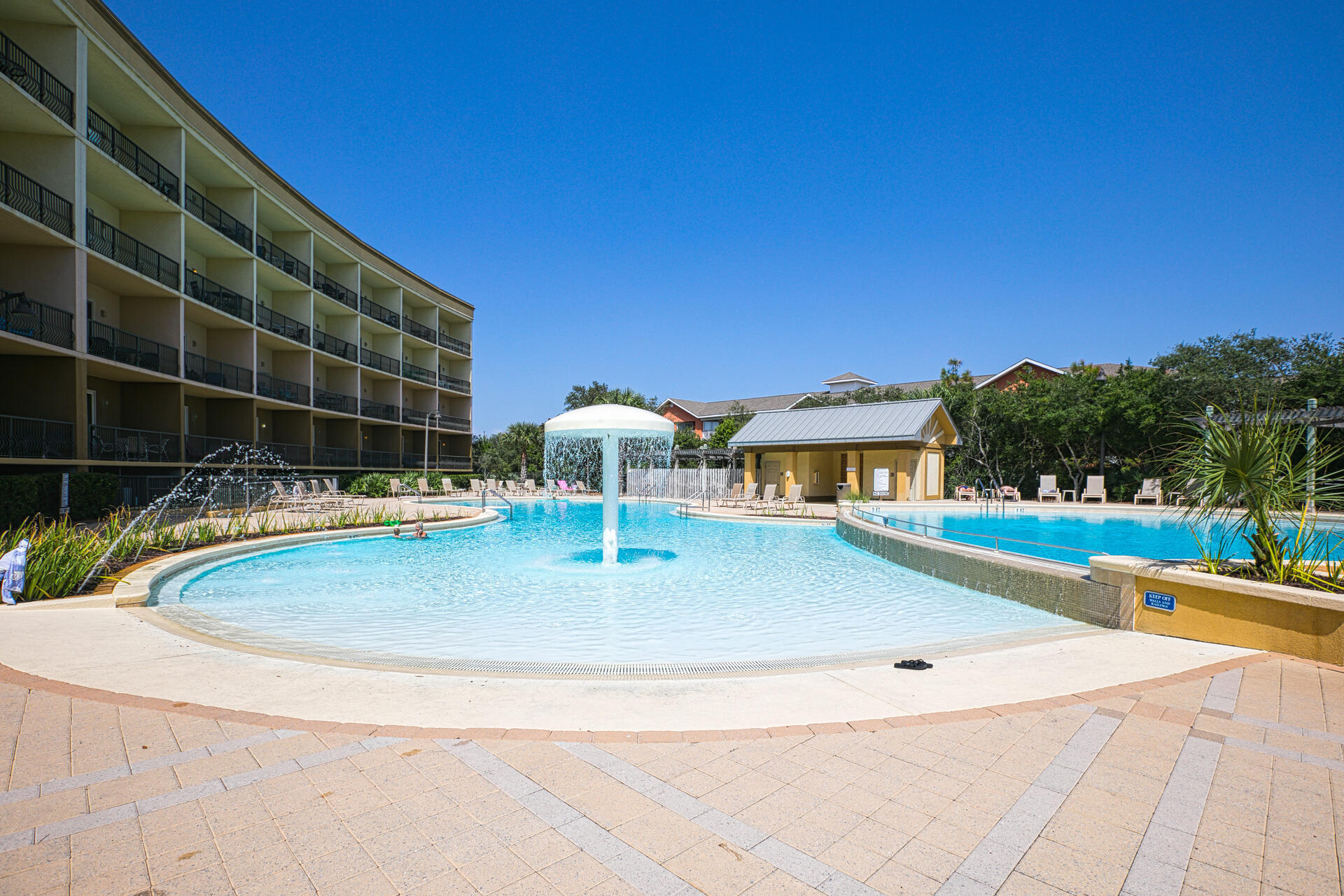 548 Sandy Cay Drive, Unit 309 Miramar Beach, FL 32550 - Photo 36 of 47 a view of a swimming pool with an outdoor seating