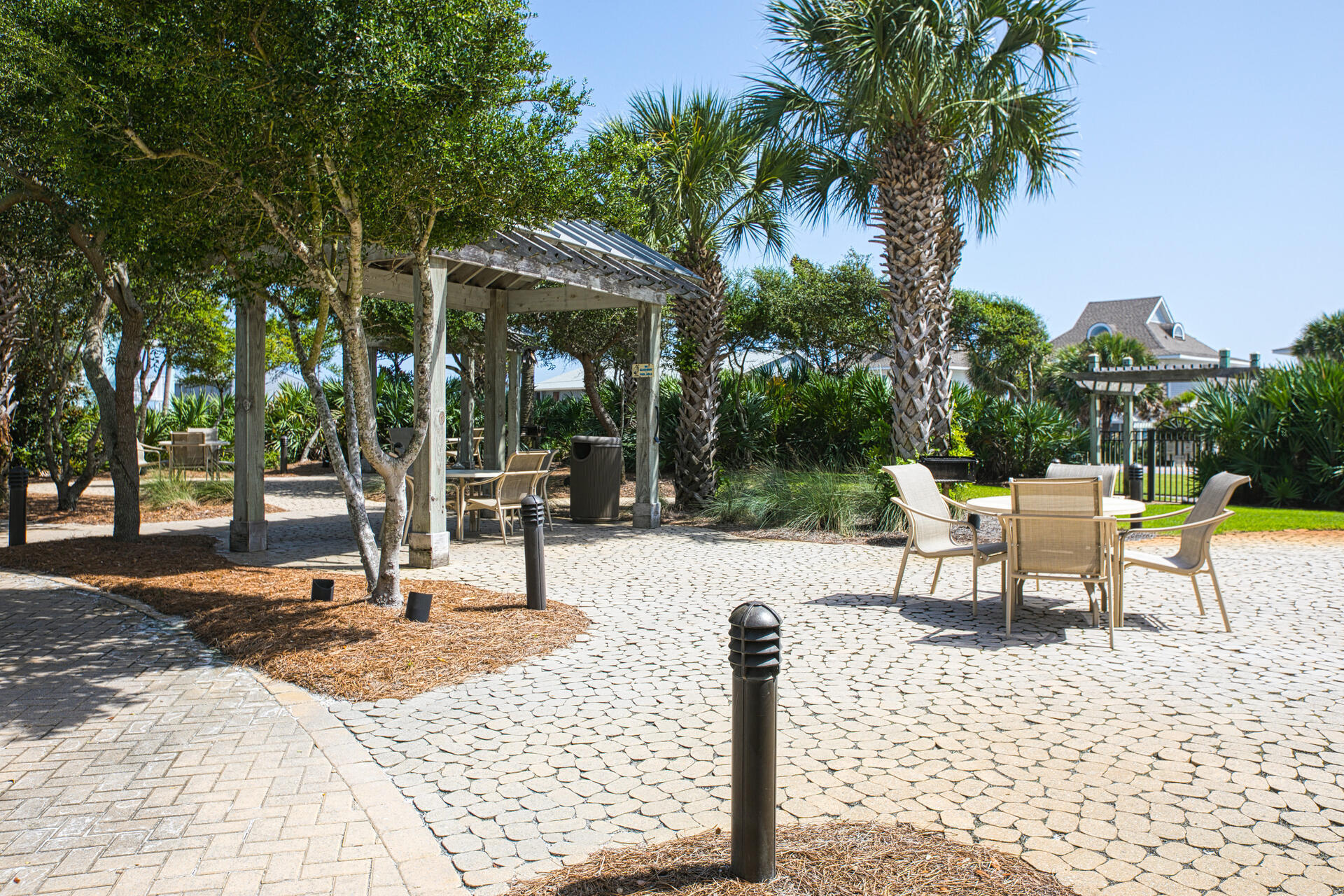 548 Sandy Cay Drive, Unit 309 Miramar Beach, FL 32550 - Photo 38 of 47 a view of a patio with a table and chairs