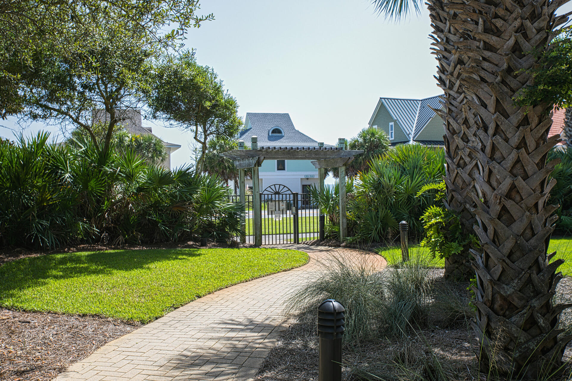 548 Sandy Cay Drive, Unit 309 Miramar Beach, FL 32550 - Photo 42 of 47 a view of a house with a yard and large trees