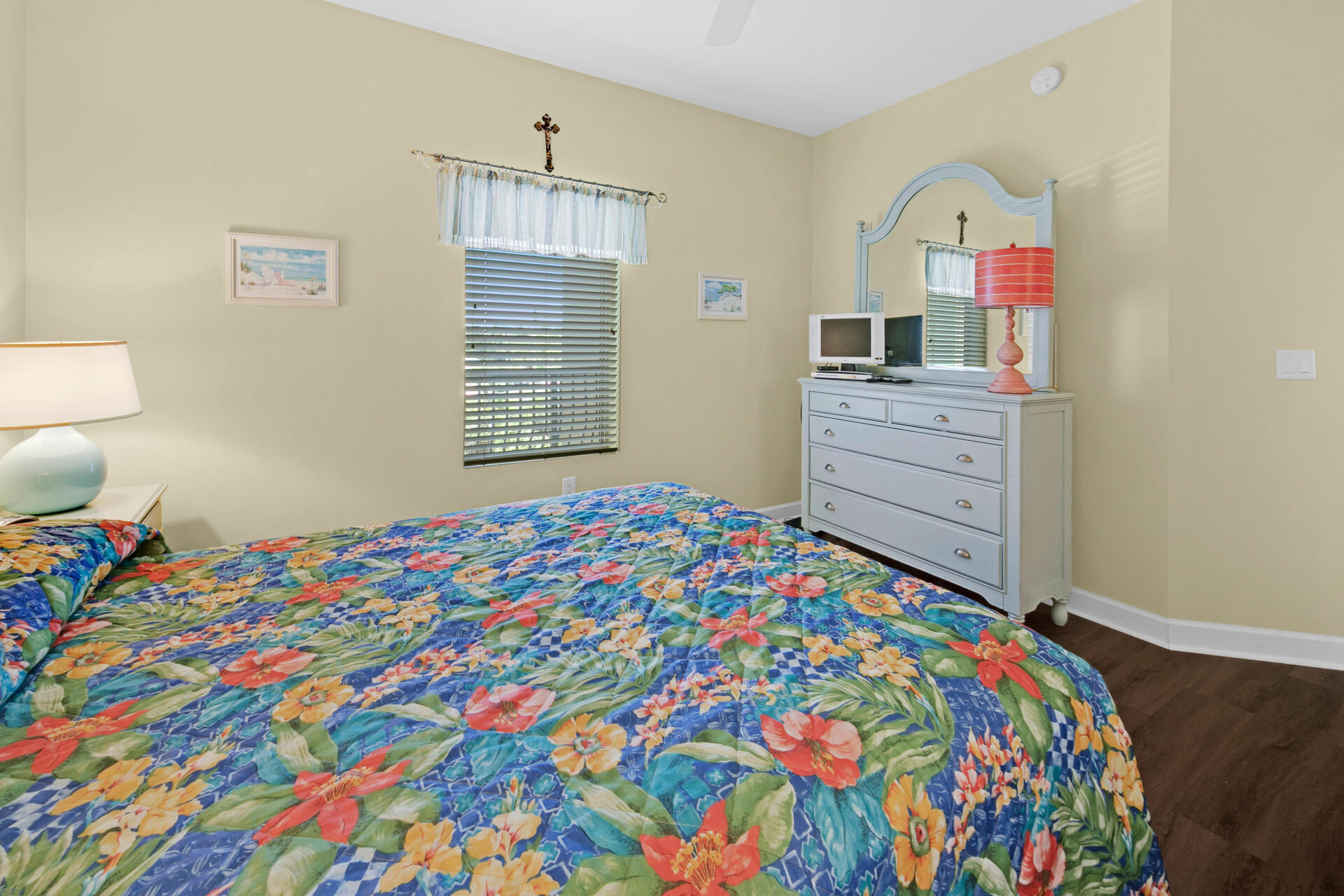 548 Sandy Cay Drive, Unit 309 Miramar Beach, FL 32550 - Photo 7 of 47 a bedroom with a bed and wooden floor
