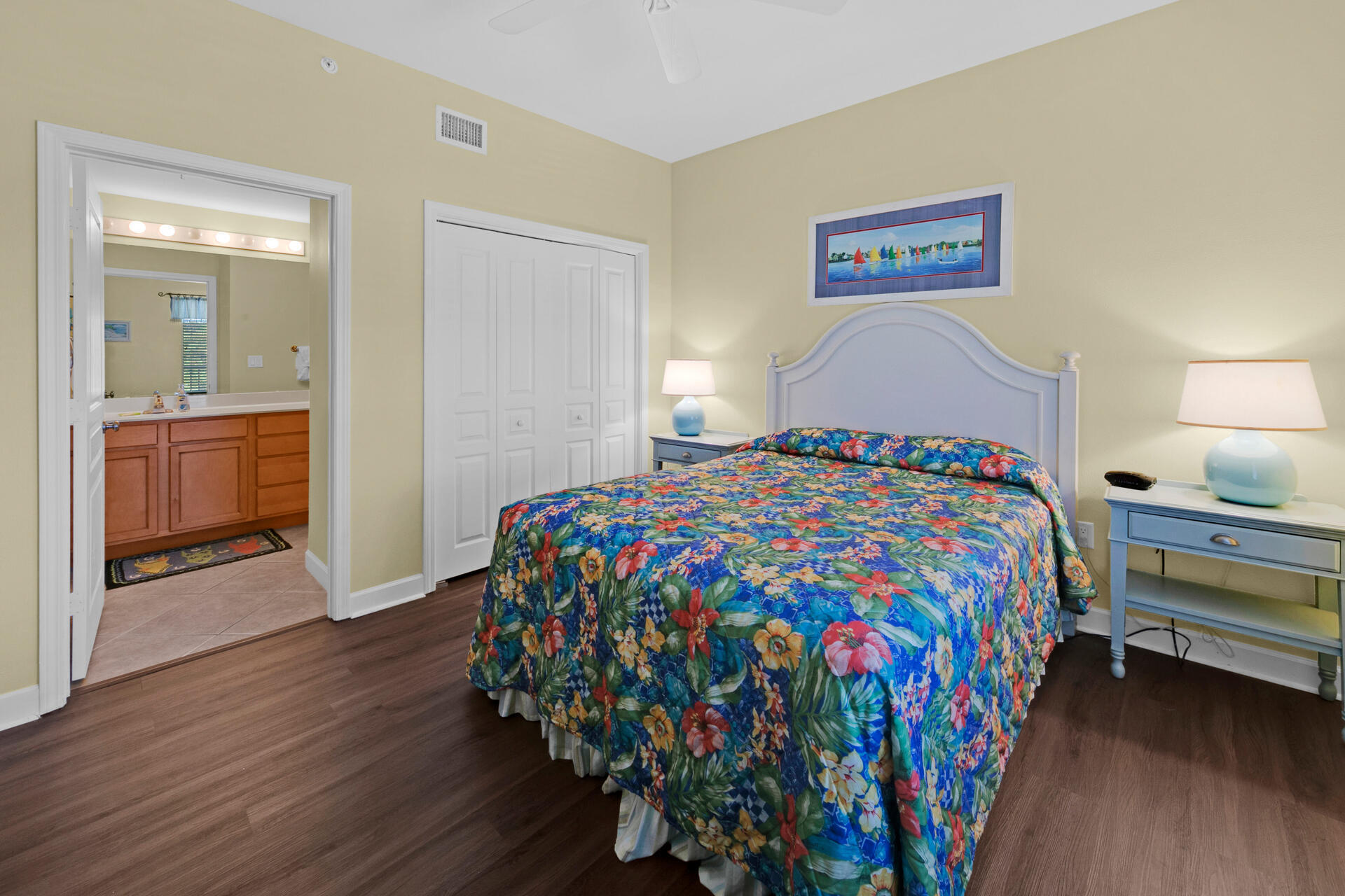 548 Sandy Cay Drive, Unit 309 Miramar Beach, FL 32550 - Photo 9 of 47 a bedroom with a bed and a lamp on table