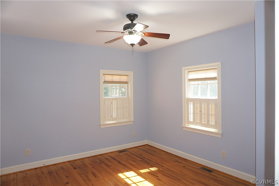 11103 Locust Ridge Place Ashland, VA 23005 - Photo 15 of 50 First Floor Bedroom with wood floors and amazing n