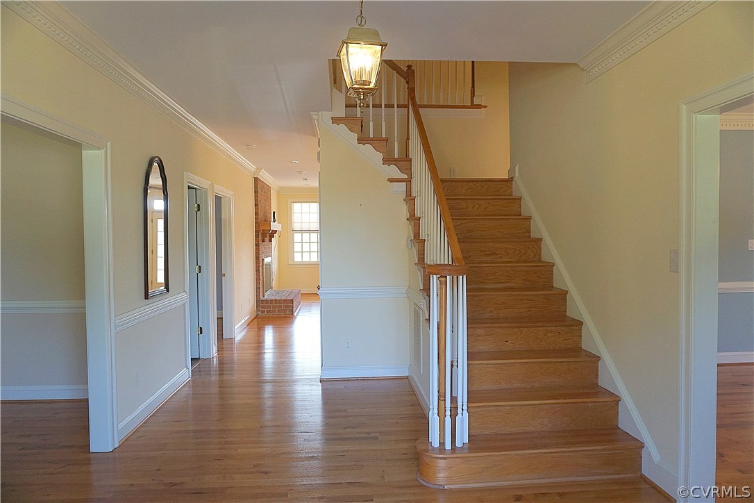 11103 Locust Ridge Place Ashland, VA 23005 - Photo 4 of 50 Bright foyer with wood floors, full bathroom, and