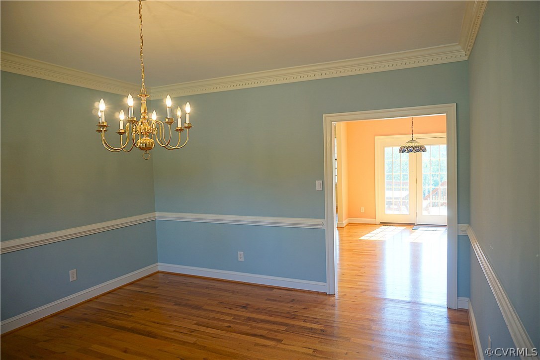 11103 Locust Ridge Place Ashland, VA 23005 - Photo 9 of 50 Formal dining just off the kitchen.