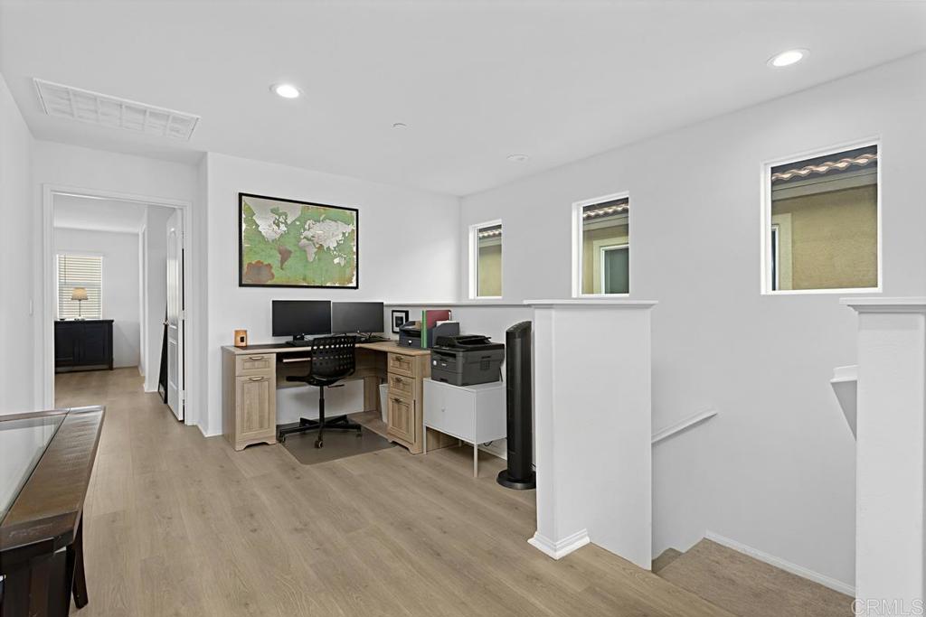 5410 Luna Way Bonsall, CA 92003 - Photo 20 of 37 a view of a workspace with furniture and wooden floor