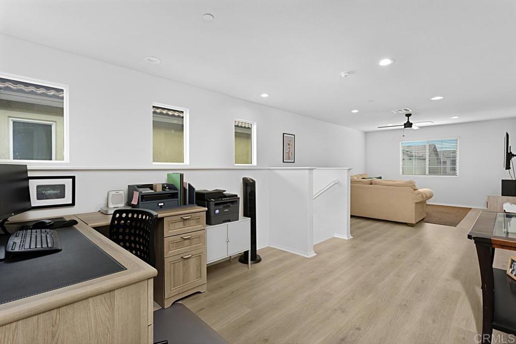 5410 Luna Way Bonsall, CA 92003 - Photo 21 of 37 a kitchen with a sink and a stove top oven